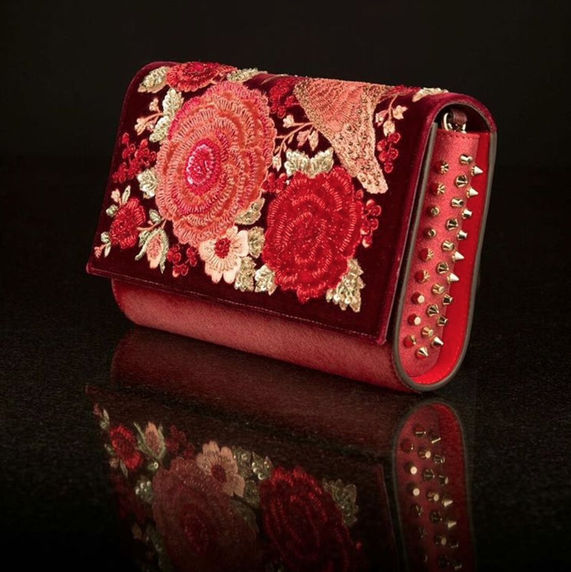 Sabyasachi Collection - Red clutch with floral embroidery and spikes
